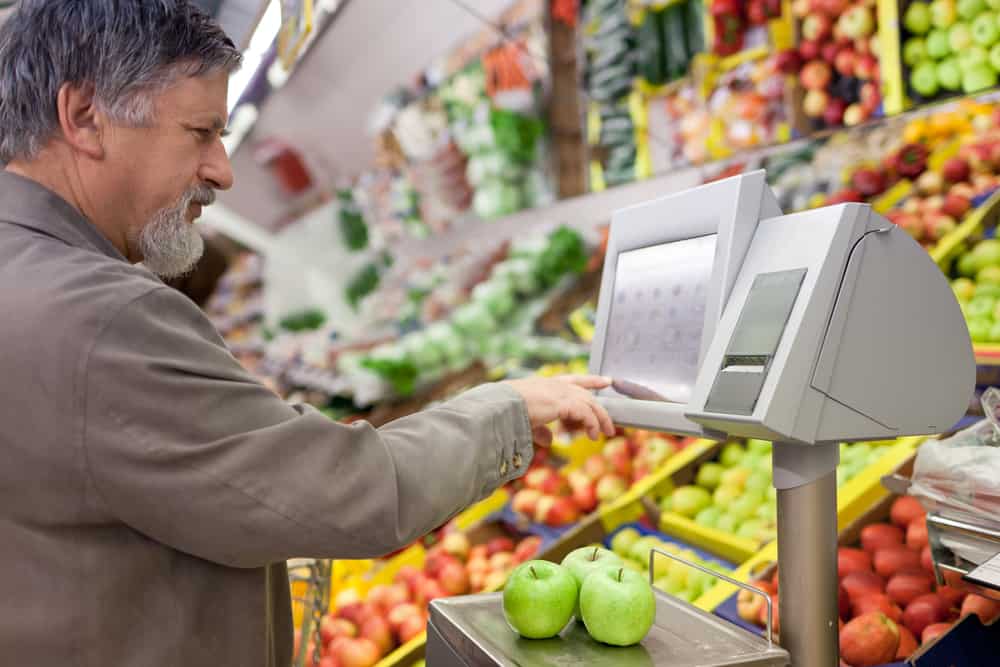 Handsome,Senior,Man,Shopping,For,Fresh,Fruit,In,A,Supermarket